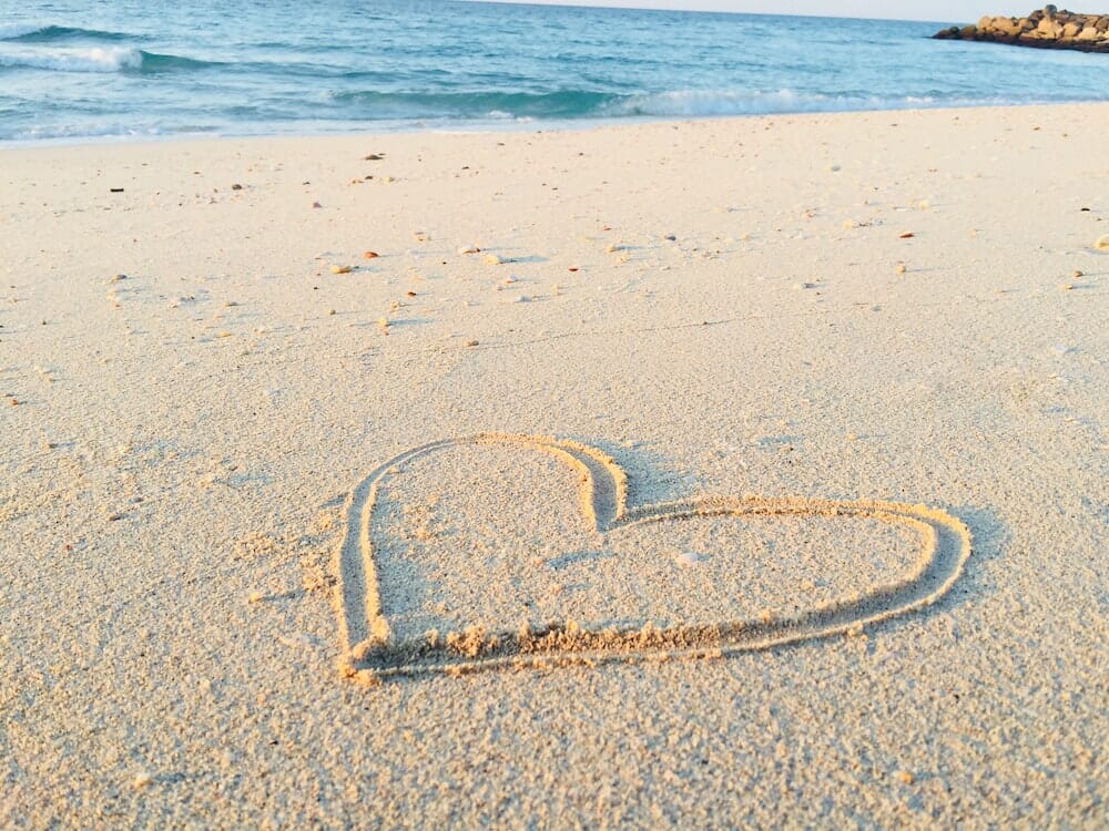Heart drawn in sand - legal design blog Something Simple First