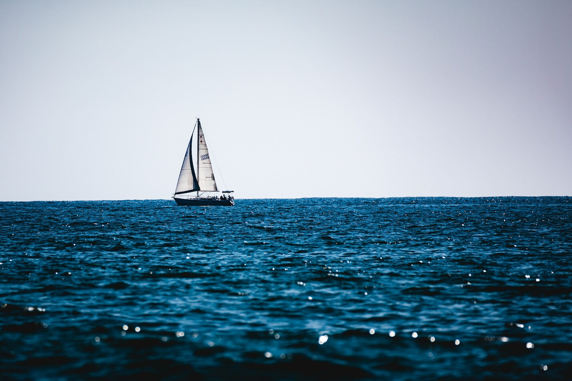 Sailboat in blue ocean - creating your blue ocean in law - Legal Design Blog Something Simple First